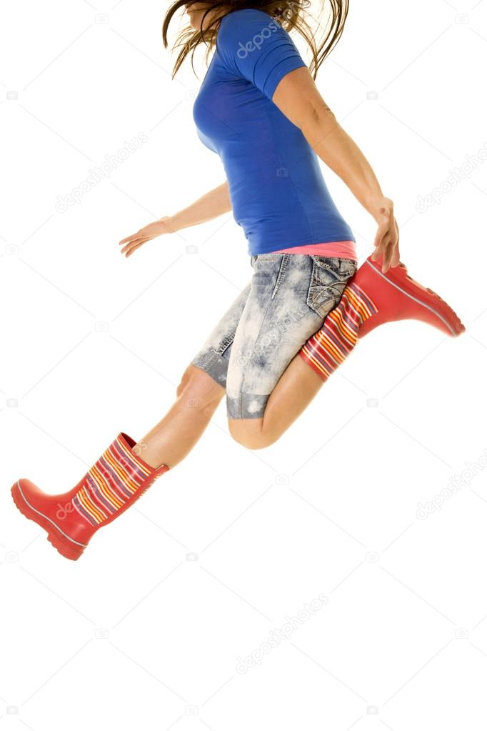 woman jump body in rain boots