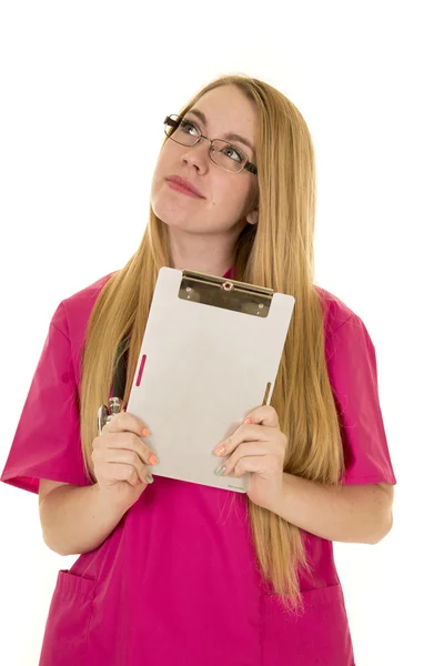 Enfermera en gafas y en traje rosa — Foto de Stock