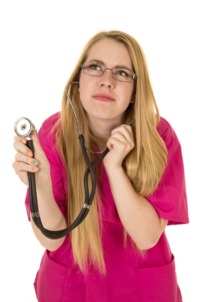 Infirmière en lunettes et en costume rose — Photo