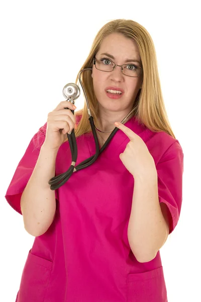 Enfermera en gafas y en traje rosa — Foto de Stock