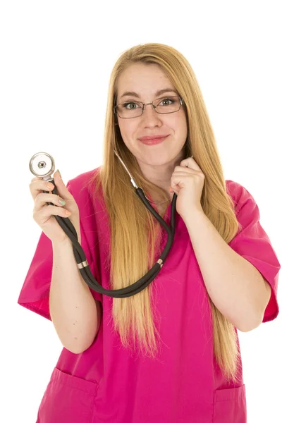 Enfermeira em óculos e em terno rosa — Fotografia de Stock