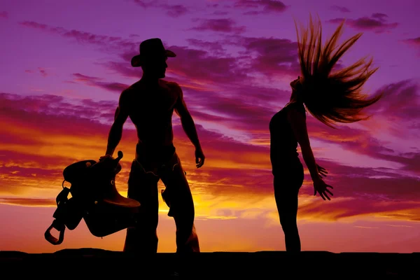 Silhouet van de vrouw en cowboy — Stockfoto