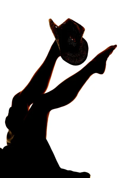 Sylwetka kobiety nogi z kapeluszem — Zdjęcie stockowe