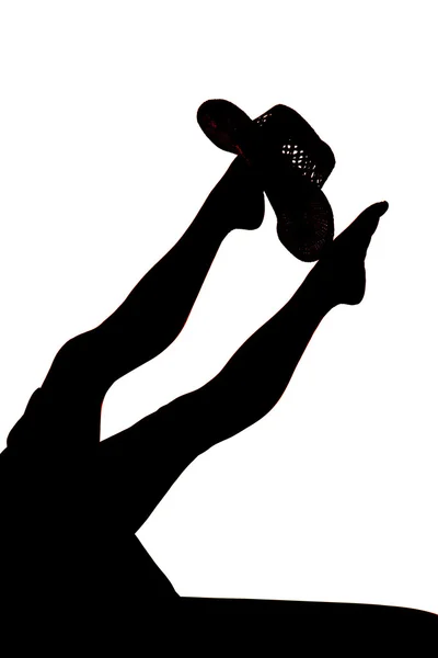 Silueta nohy žena s kloboukem — Stock fotografie