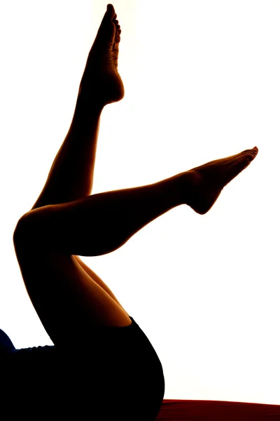 Silhouette delle gambe della donna — Foto Stock