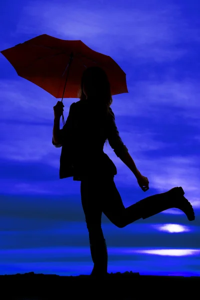 Silhouette of woman with umbrella — Stock Photo, Image