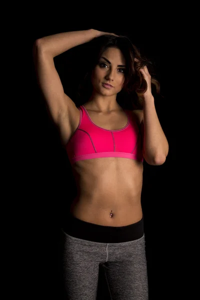 Woman in pink sport bra — Stock Photo, Image