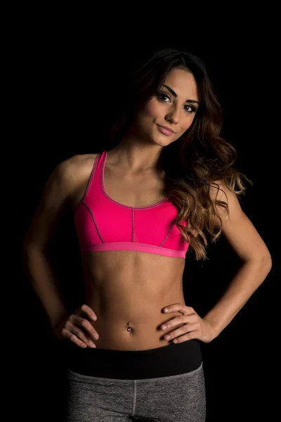 Woman in pink sport bra — Stock Photo, Image