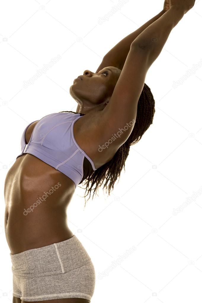 Fit woman stretching back