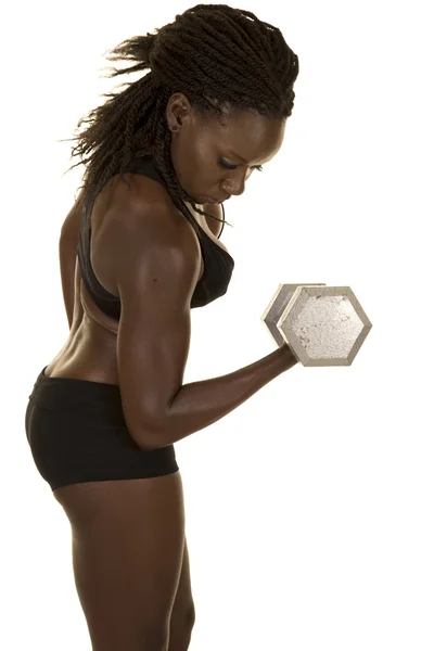 Woman  curling one arm — Stock Photo, Image