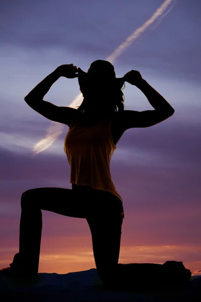 Silhouet van cowgirl bij zonsondergang — Stockfoto