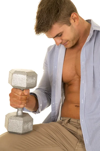 Strong man holding dumbbell — Stock Photo, Image