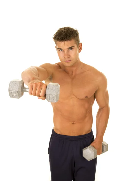 Young man exercising with dumbbells — Stock Photo, Image