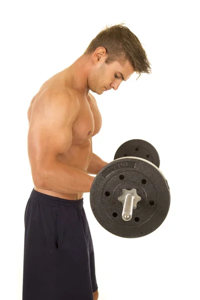 Young man exercising with barbell — Stock Photo, Image