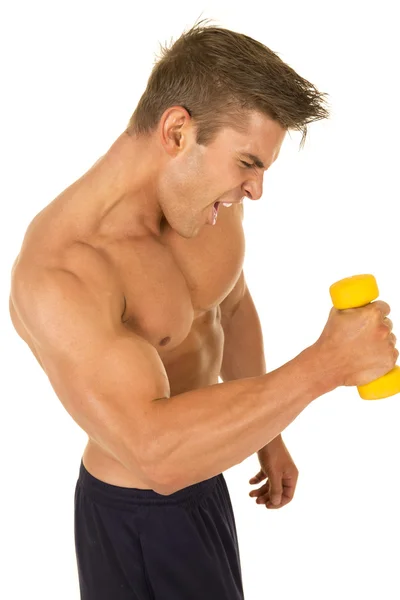 Strong man with small weight — Stock Photo, Image