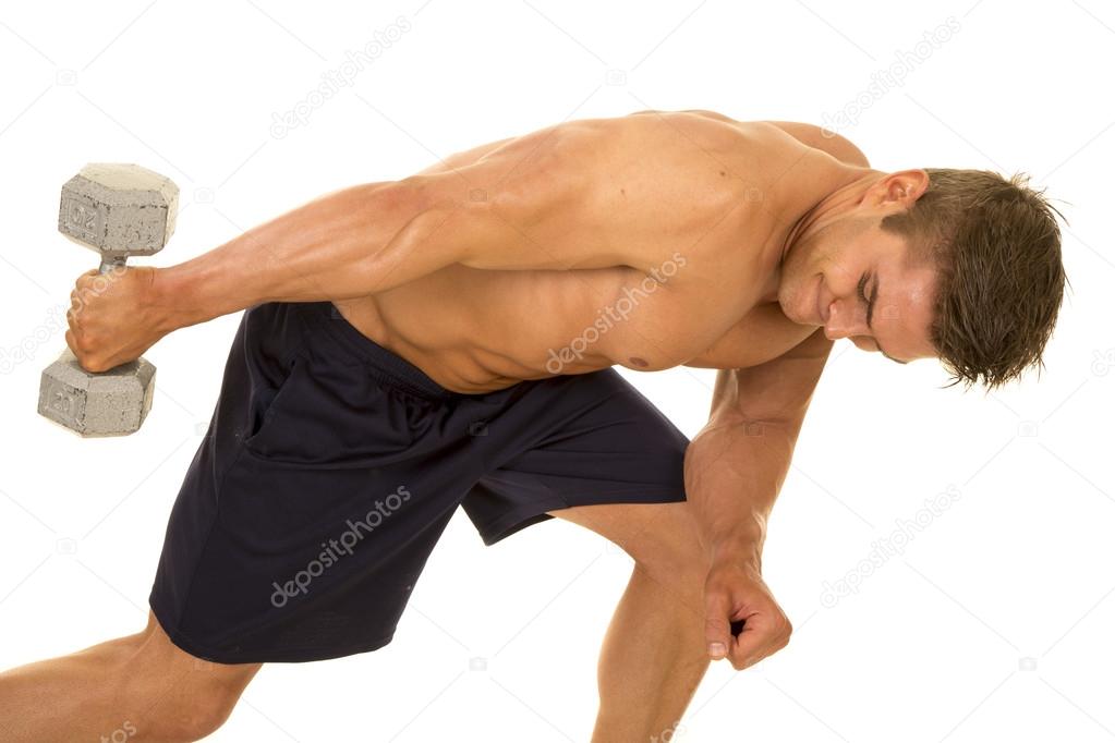 young man exercising with dumbbells