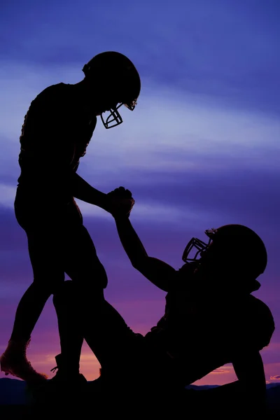 Silhouette of two football players — Stock Photo, Image