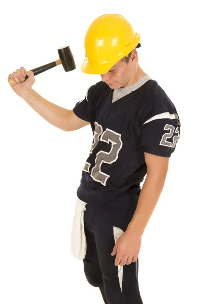Giocatore di calcio con cappello duro — Foto Stock