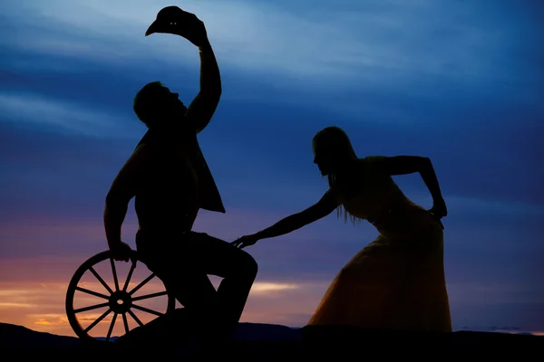 Silhouette of cowboy and woman — Stock Photo, Image