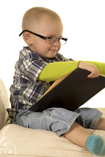 Little boy with glasses reading — Stock Photo, Image