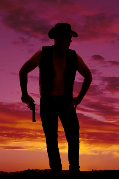 Silhouette of cowboy with pistol — Stock Photo, Image