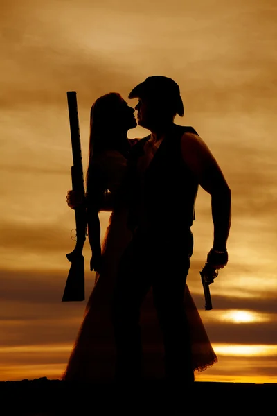 Silhouette of cowboy and woman — Stock Photo, Image