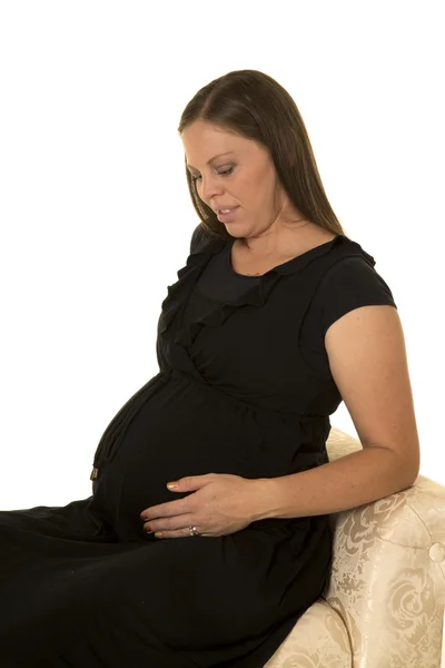 Mujer embarazada en vestido negro — Foto de Stock