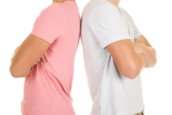 Två pojkar kroppar rygg mot rygg armar vikta — Stockfoto