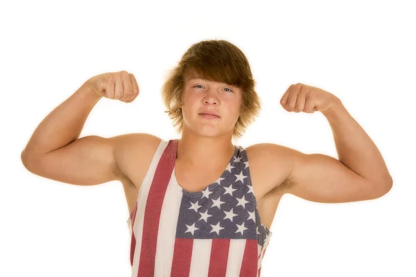 Young man in flag shirt flexing muscles — Stock Photo, Image