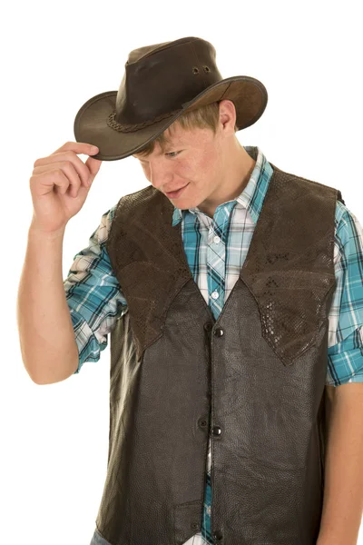 Young cowboy in vest touch hat look down — Stock Photo, Image