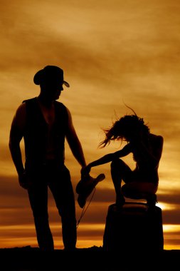 Silhouette kovboy ve çoban kız