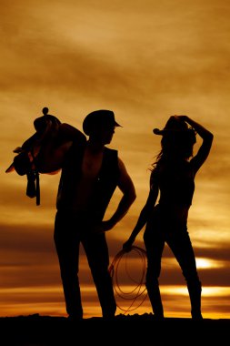 Silhouette kovboy ve çoban kız