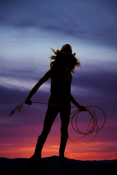 Silhouette di bella cowgirl — Foto Stock