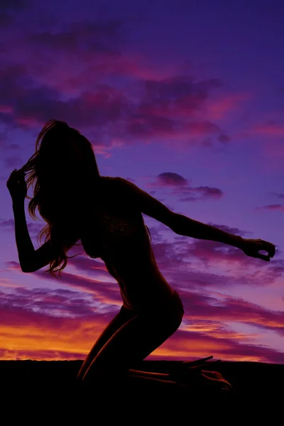 Silhouette einer Frau im Bikini — Stockfoto