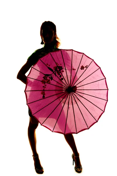 Silhouette of beautiful woman with umbrella — Stock Photo, Image