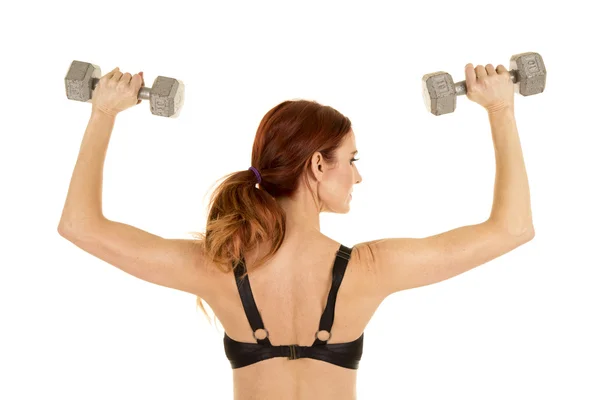 Donna che esercita con i pesi — Foto Stock