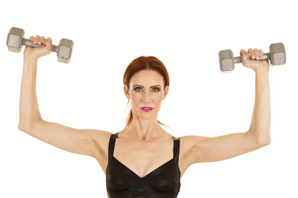 Young woman lifting dumbbells — Stock Photo, Image