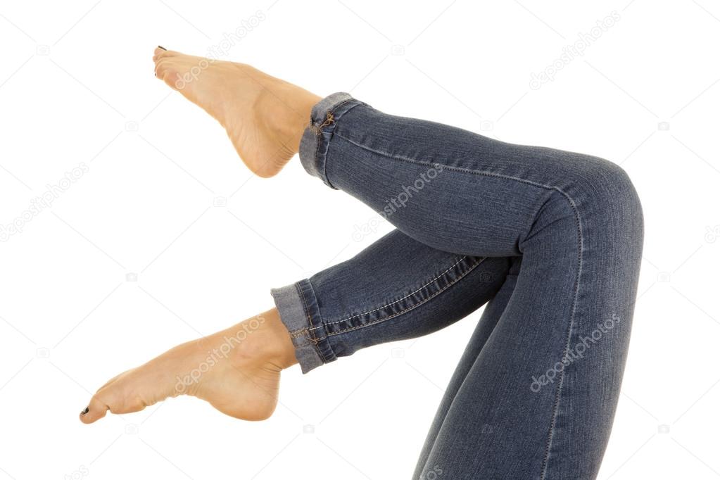 woman legs in denim pants