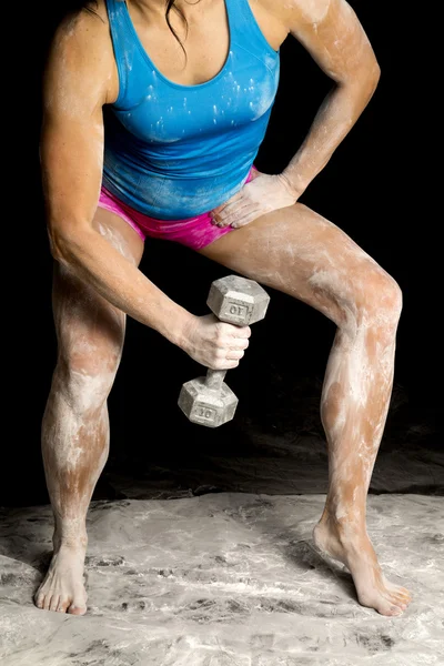 Woman exercising with dumbbell — Stock Photo, Image