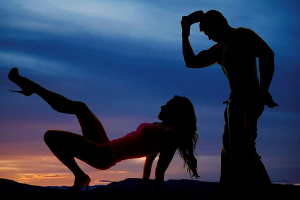 Silhouette of woman and cowboy — Stock Photo, Image