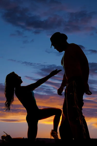 Silhouette of cowboy and woman — Stock Photo, Image