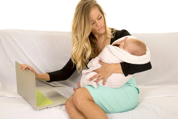 business woman with laptop and baby