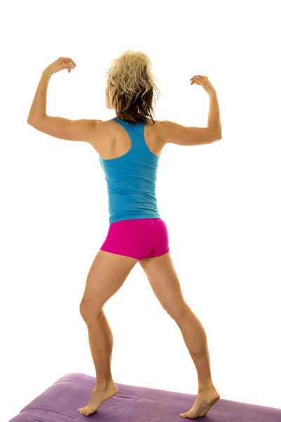 Fitness woman flexing body — Stock Photo, Image