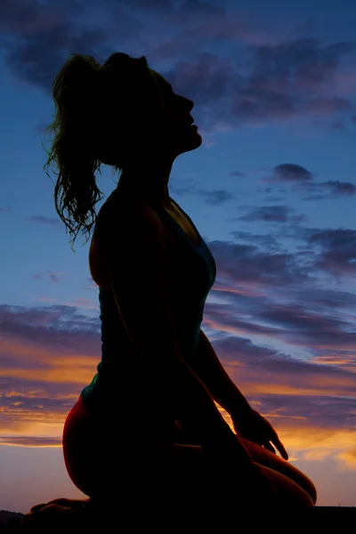 Silhouette of woman at sunset sky — Stock Photo, Image