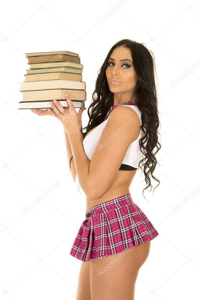 Sexy schoolgirl holding books side