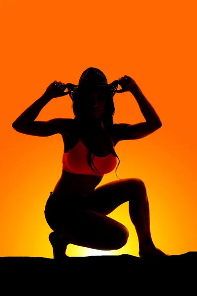 Silhouet van sexy cowgirl vrouw — Stockfoto
