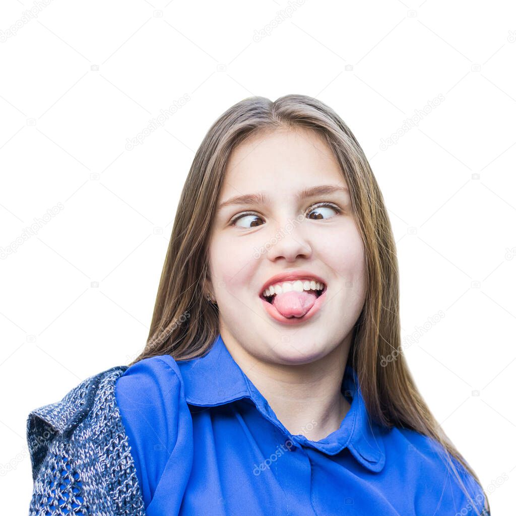 Headshot Portrait of happy teenage ginger girl with smiling looking at camera isolated on white background. Funny? crazy face.