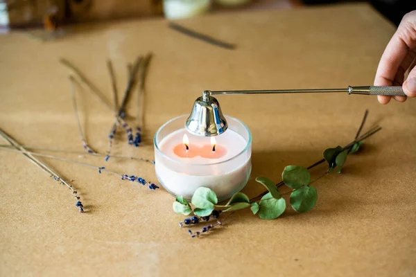 Tools for making candles of white soy wax flakes, essential oil, wicks on pergament background. Flat lay, overhead shot. Ecological lifestyle Soy wax, wick, cap, lavender - ingredient for handmade