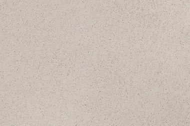 Yüzey düzgün bir ışık tonu ile ince bir doku sergiliyor. Başvuru sürecindeki küçük kalıpları gösteriyor, yapım çalışmalarını gösteriyor. Arkaplanda ince detaylar var.