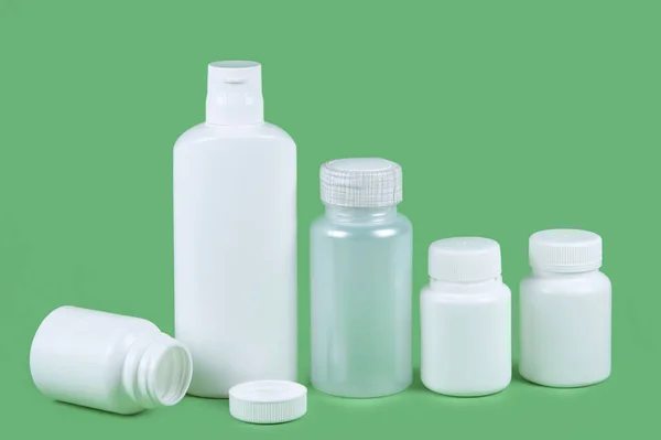 Five Pills Bottles Green Background Copy Space Text Pharmaceutical Product — Stock Photo, Image